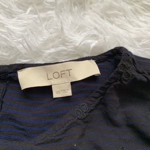 Blue blouse with black stripes